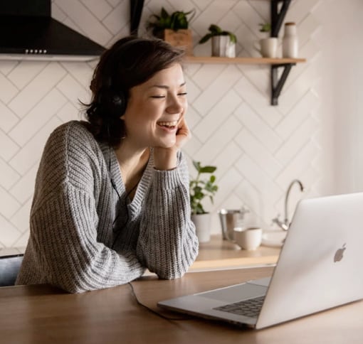 Woman in videocall on laptop